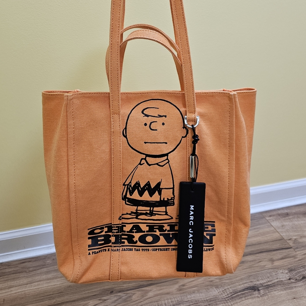 🎉HOST PICK🎉MARC JACOBSx Peanuts Charlie Brown The Tag tote - Picture 1 of 13